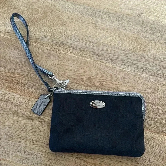 Coach Handbags - NWOT Coach Canvas Wristlet in Black with Silver